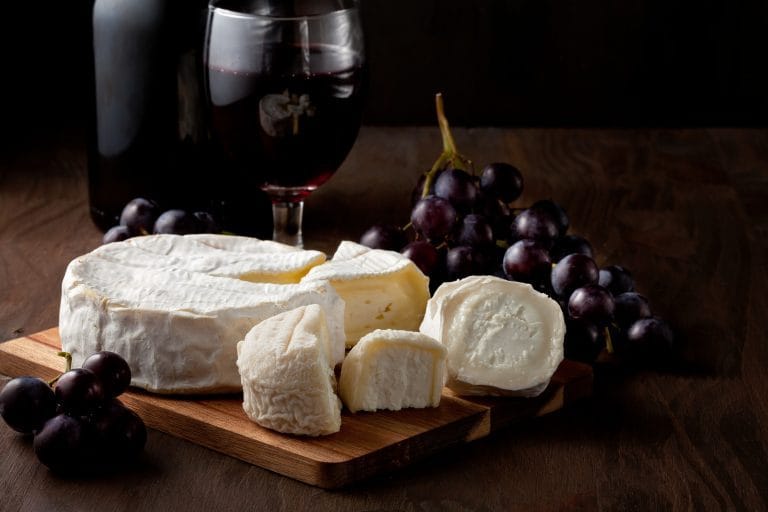 variety-of-different-cheese-with-wine-and-fruits