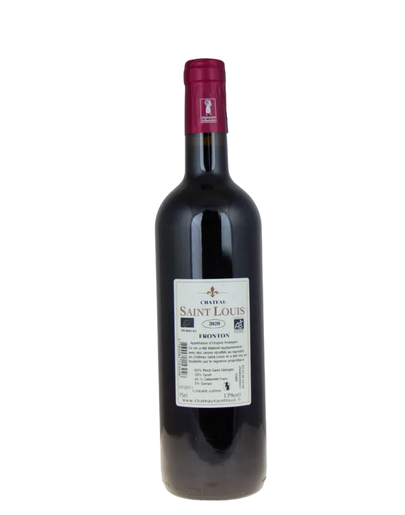 Verres de vin rouge Tradition Rouge 2020 accompagnant la bouteille primée, parfait pour un dîner élégant ou un apéritif raffiné.